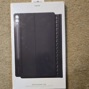 NIB Samsung Black Book Cover Keyboard for S10+ Tablet. Was opened but never used